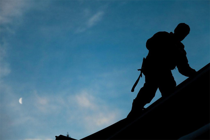 Construction worker on a roof