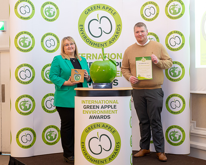 PTSG representatives being awarded a Green Apple Environment Award