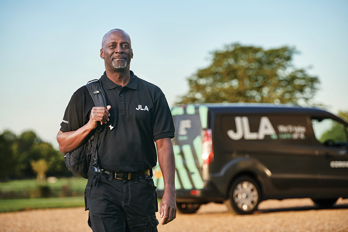 A JLA engineer and his van