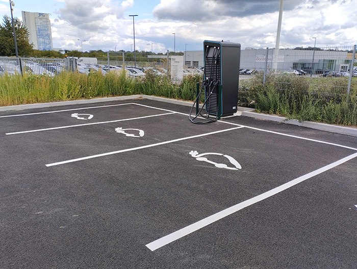 Electric vehicle charging units in an outside car park
