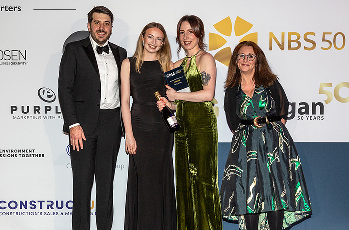 Sentry Doors staff with their Best Branding Award at the Construction Marketing Awards 2023